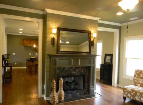 A fireplace in the middle of a living room.