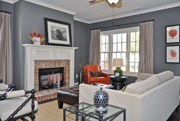 A living room with a fireplace and a couch