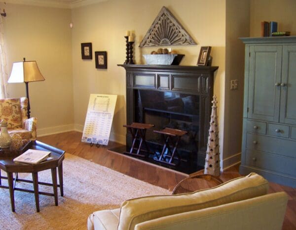 A living room with a fireplace and a couch