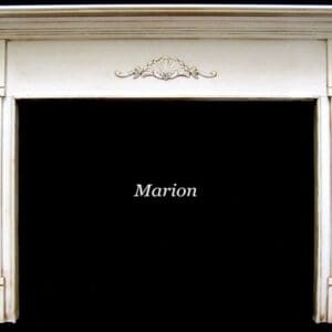 A fireplace with the name marion on it.