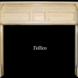 A fireplace mantle with the words " tellico " above it.