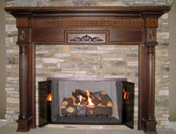 A fireplace with wood burning in it