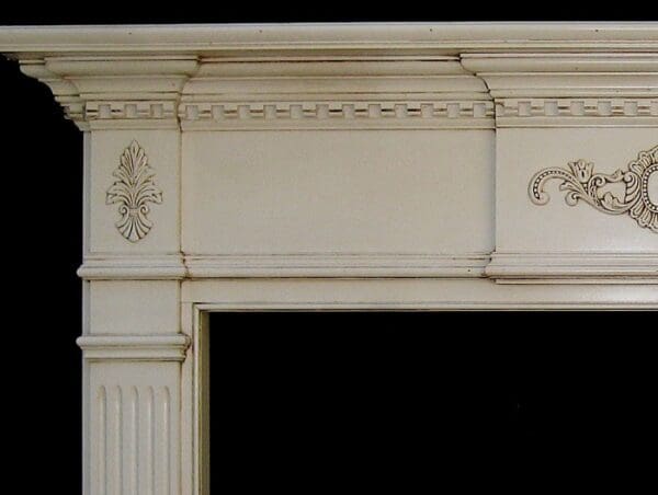 A fireplace mantle with a black background