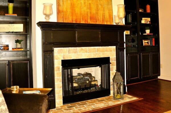 A fireplace with a fire place in the center of it.