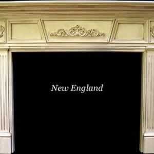 A fireplace with the words " new england " written on it.