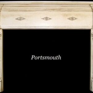 A white fireplace mantle with the word portsmouth written underneath it.