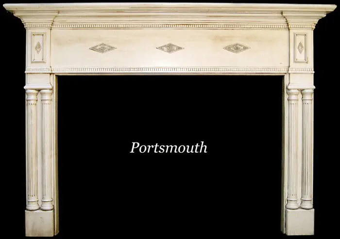 A white fireplace mantle with the word portsmouth written underneath it.