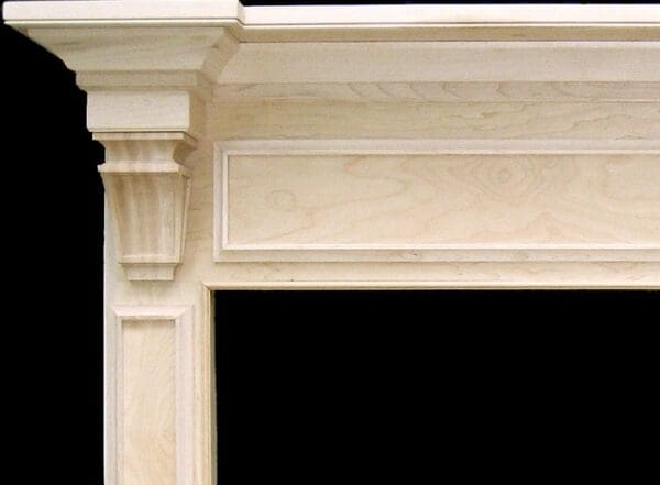 Unpainted wooden fireplace mantel.