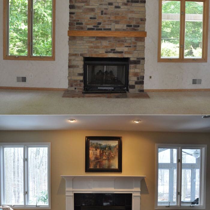 A fireplace in the middle of two different rooms.